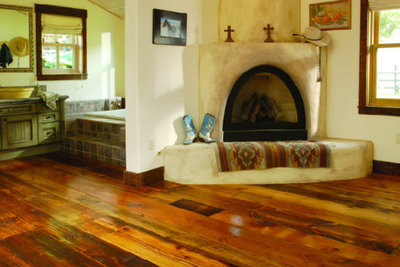 Hardwood Flooring in front of stucco fireplace