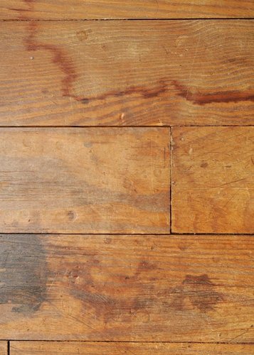 Scratched and stained hardwood floor